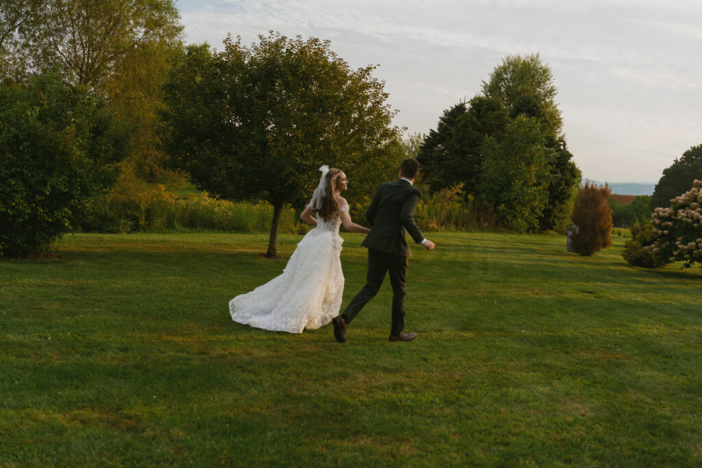 bride and groom at golden hour at the end of their michigan elopement timeline