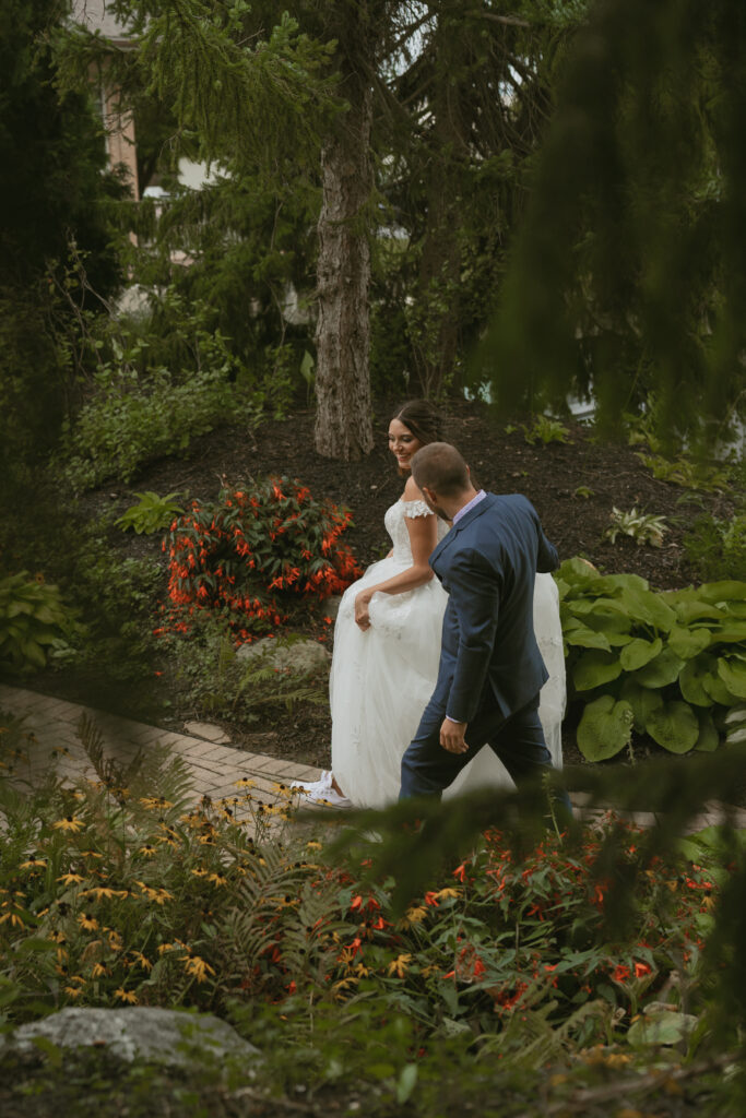 Bride and Groom share a walk through a secluded path