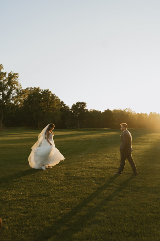 newlyweds share a moment together during golden hour