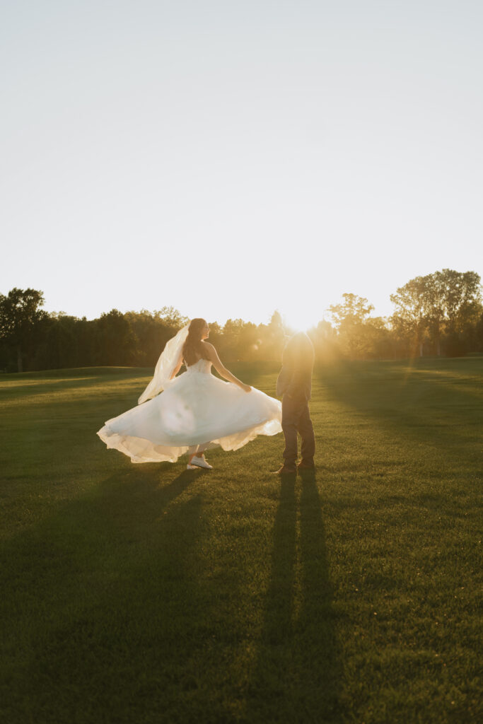 A couple dances in the goldenlight glow