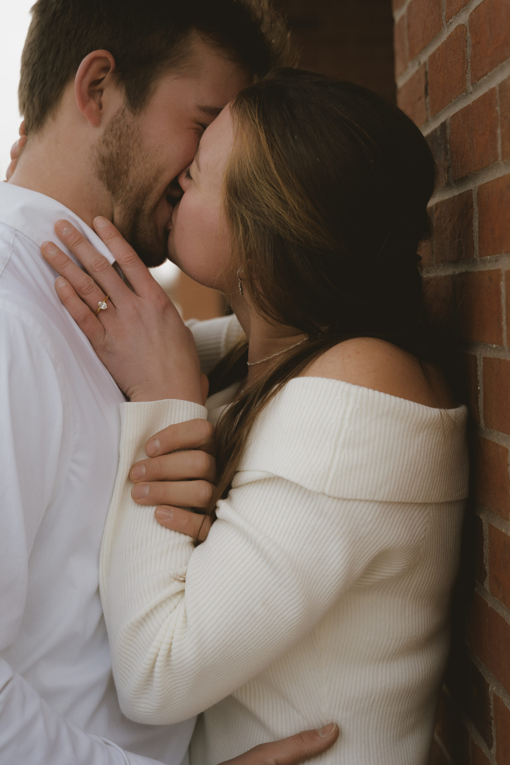 West Michigan Elopement - Couple kisses in front of the courthouse after their wedding.