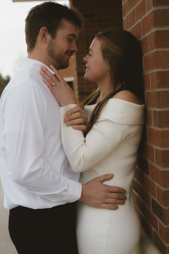 Couple embraces outside of the courthouse