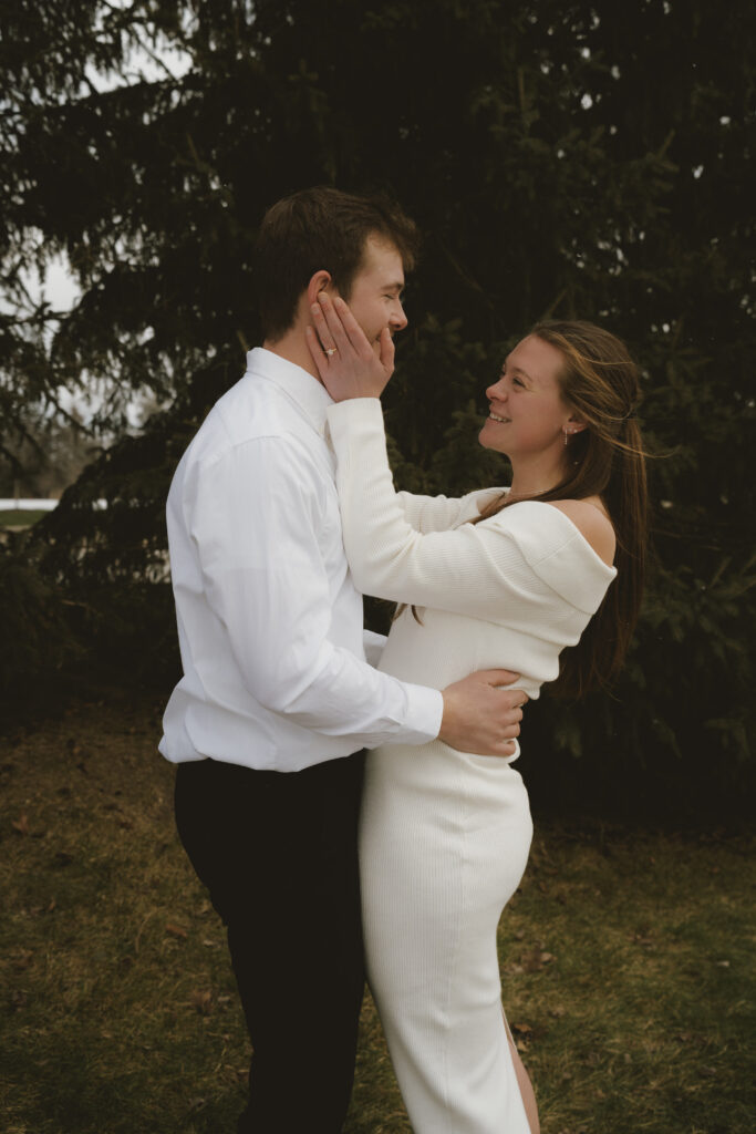 West Michigan Wedding Elopement: Couple embraces outside of the courthouse