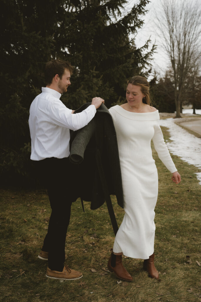 Couple embraces outside of the courthouse: West Michigan Wedding Photos