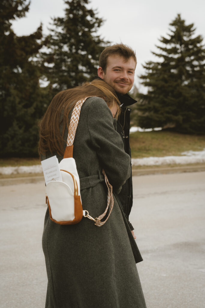 West Michigan elopement photographer capturing authentic moments of love at the courthouse