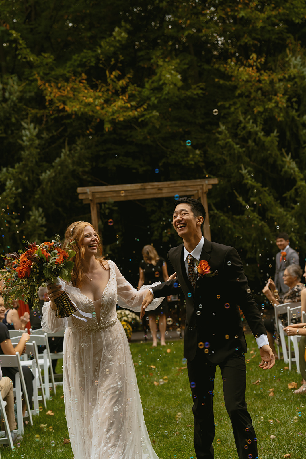stunning bride and groom share intimate moments during their micro wedding as they leave their wedding ceremony