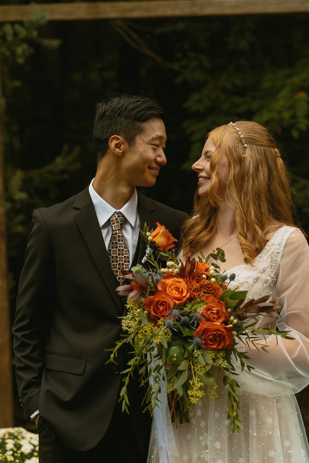 bride and groom share an intimate moment during their micro wedding