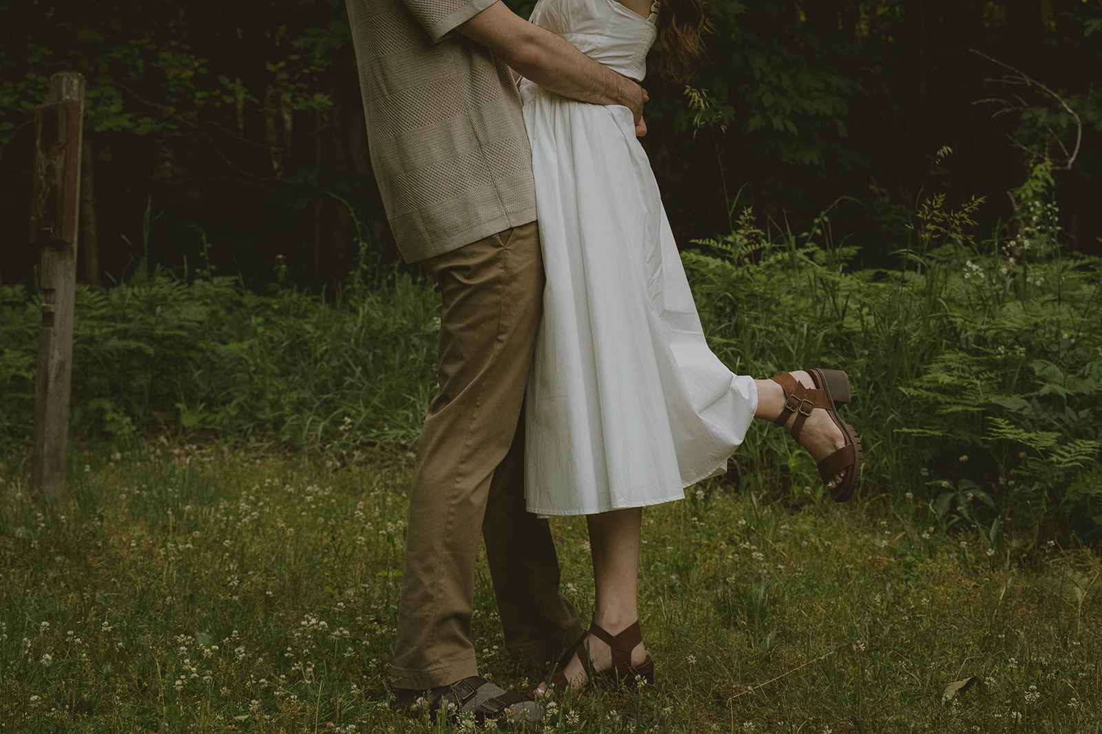 documentary style photo from a beautiful engagement photo shoot in a Grand Rapids park