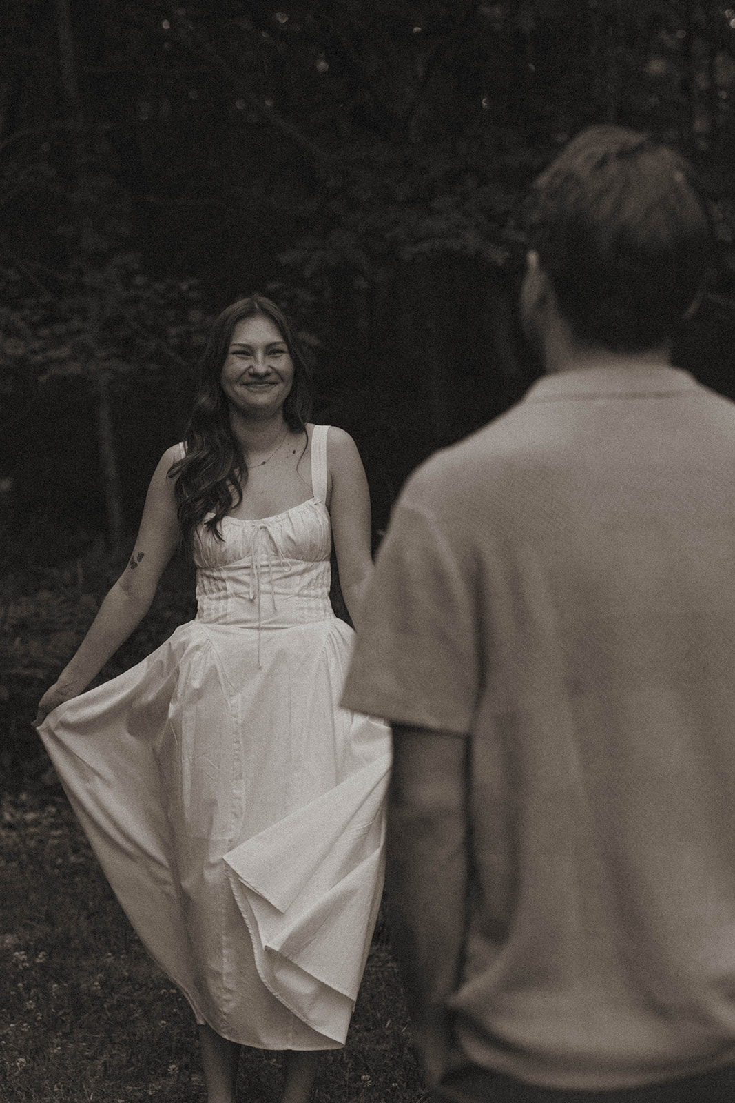 candid photo from a cinematic Grand Rapids engagement photoshoot