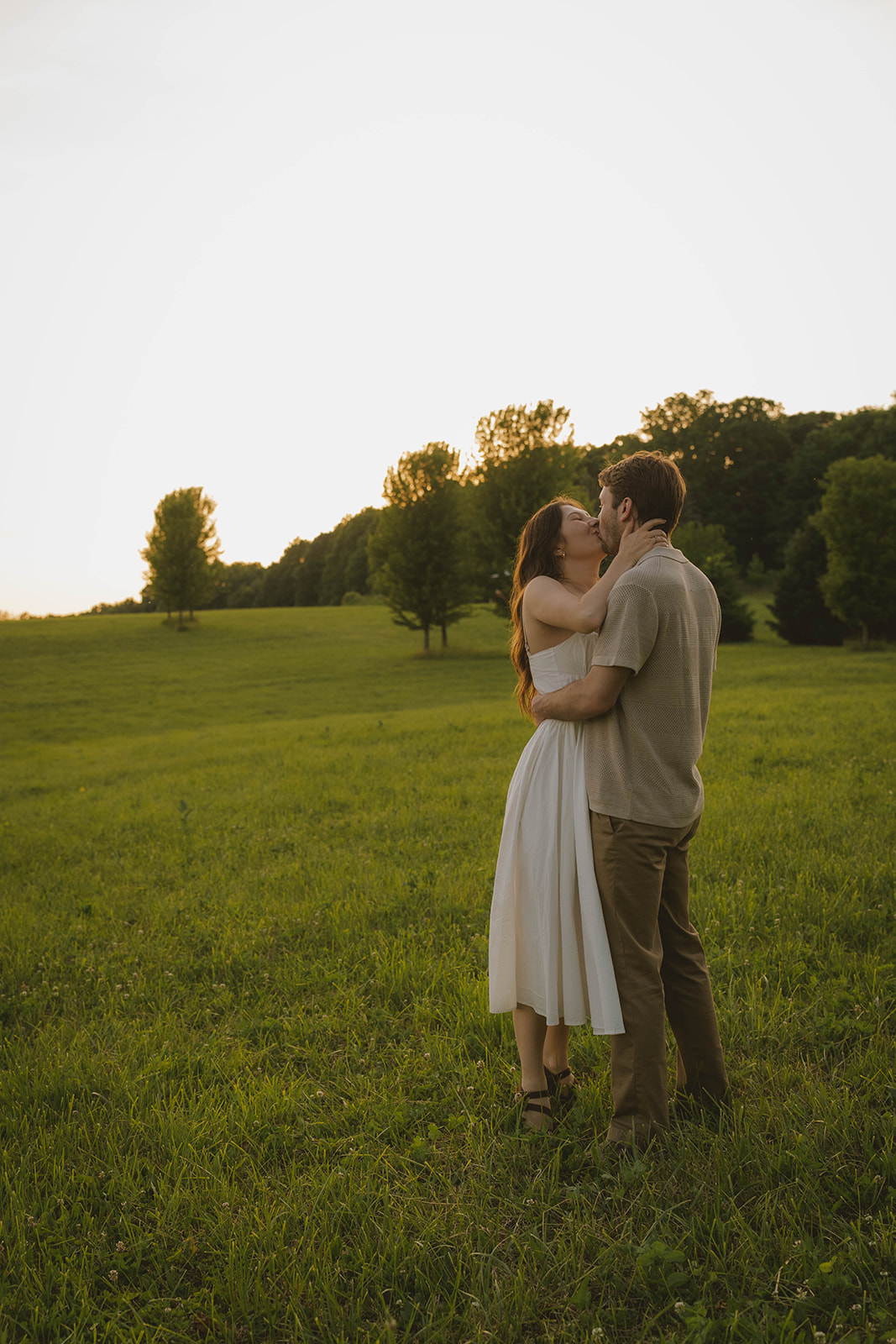 romantic engagement photos during a golden hour session in Michigan