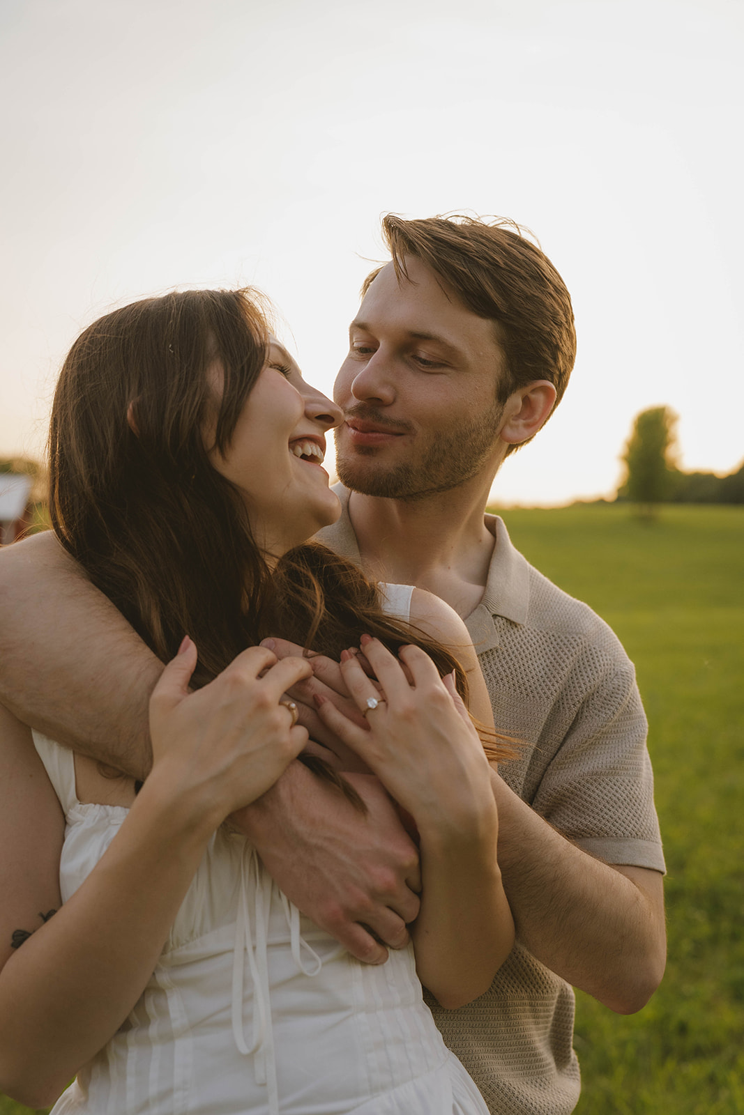 romantic engagement photos during a golden hour session in Michigan