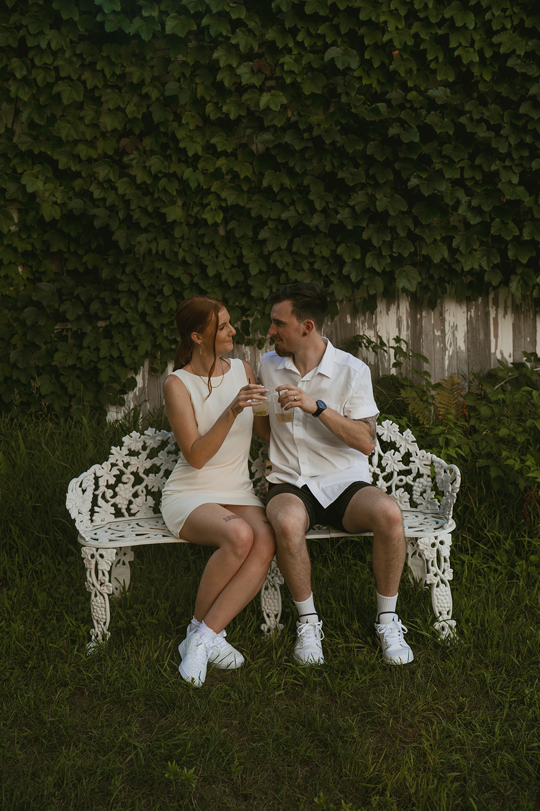 bride and groom pose together during their backyard adventure photoshoot 