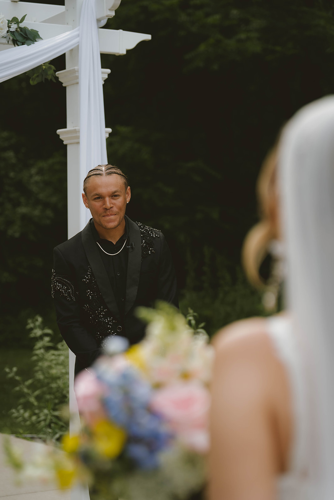 stunning bride enters her outdoor weatherproof wedding day