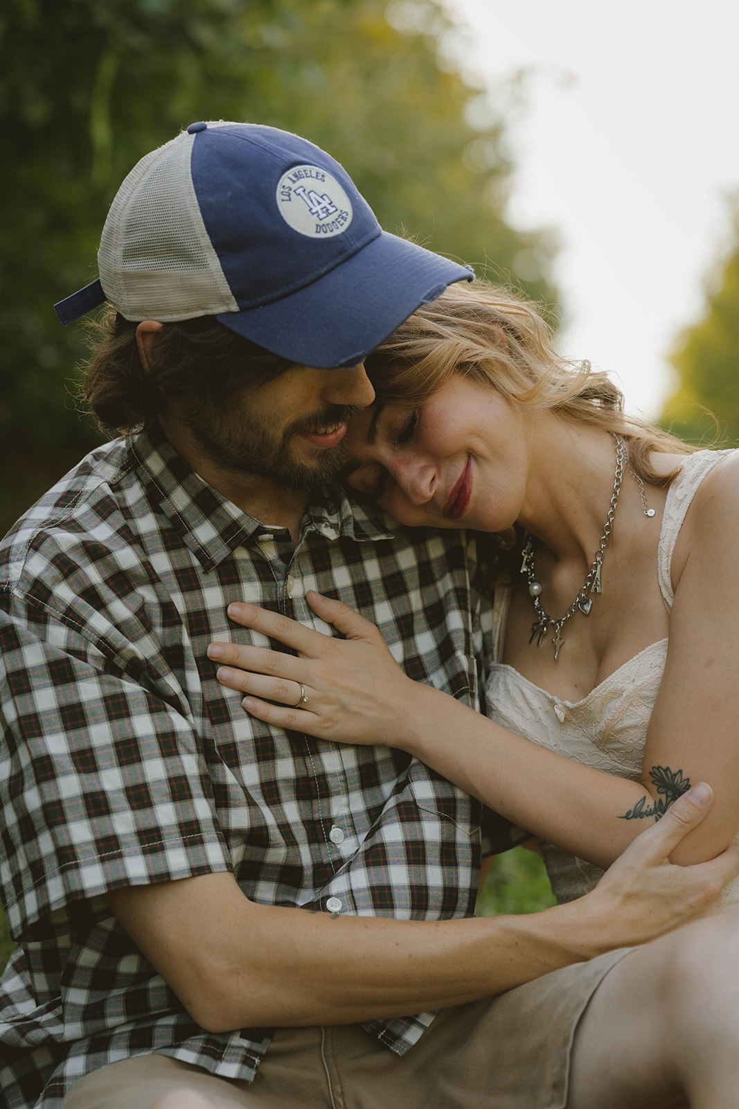 couple share an intimate moment during their engagement photos