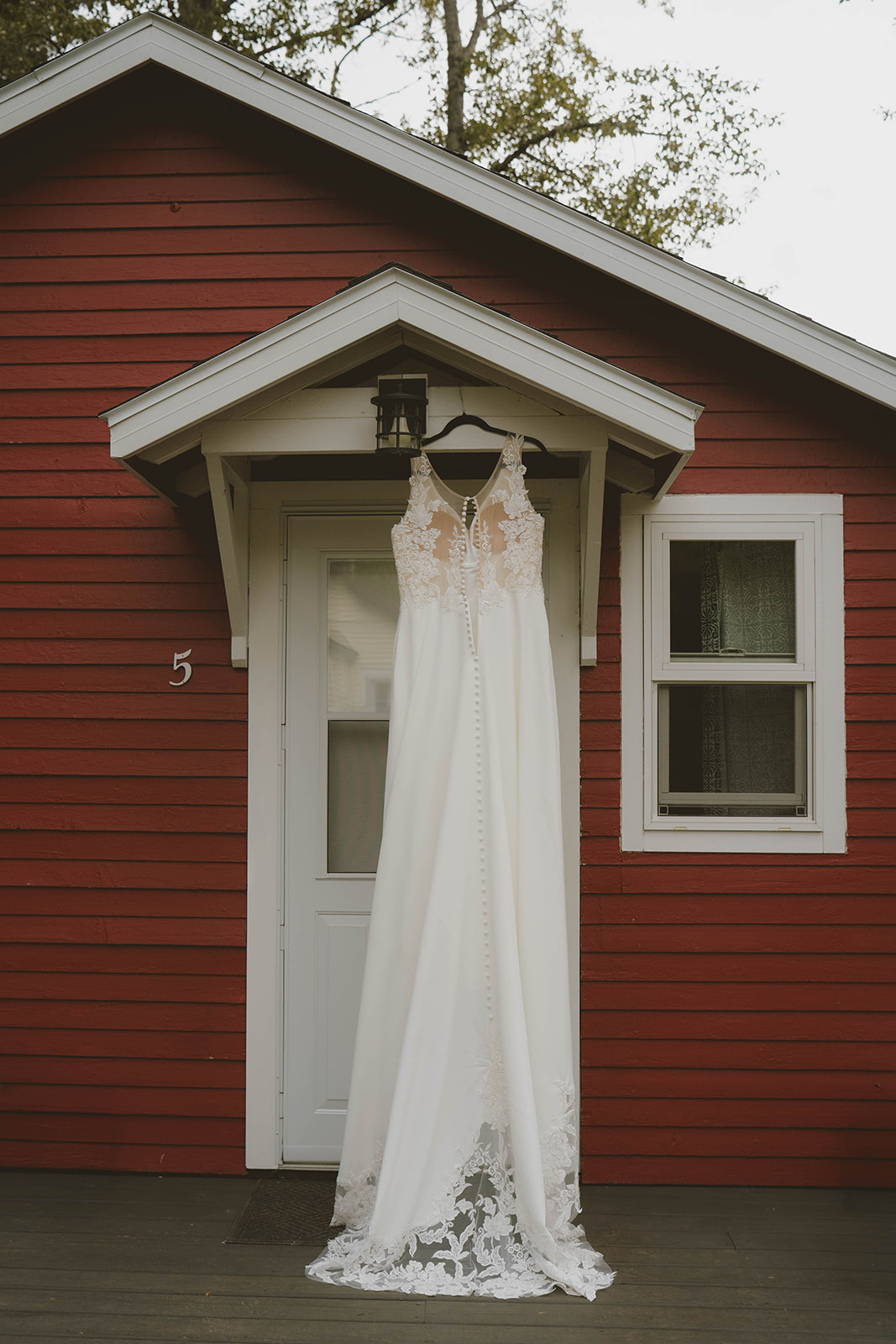 brides dress hangs ready for the wedding