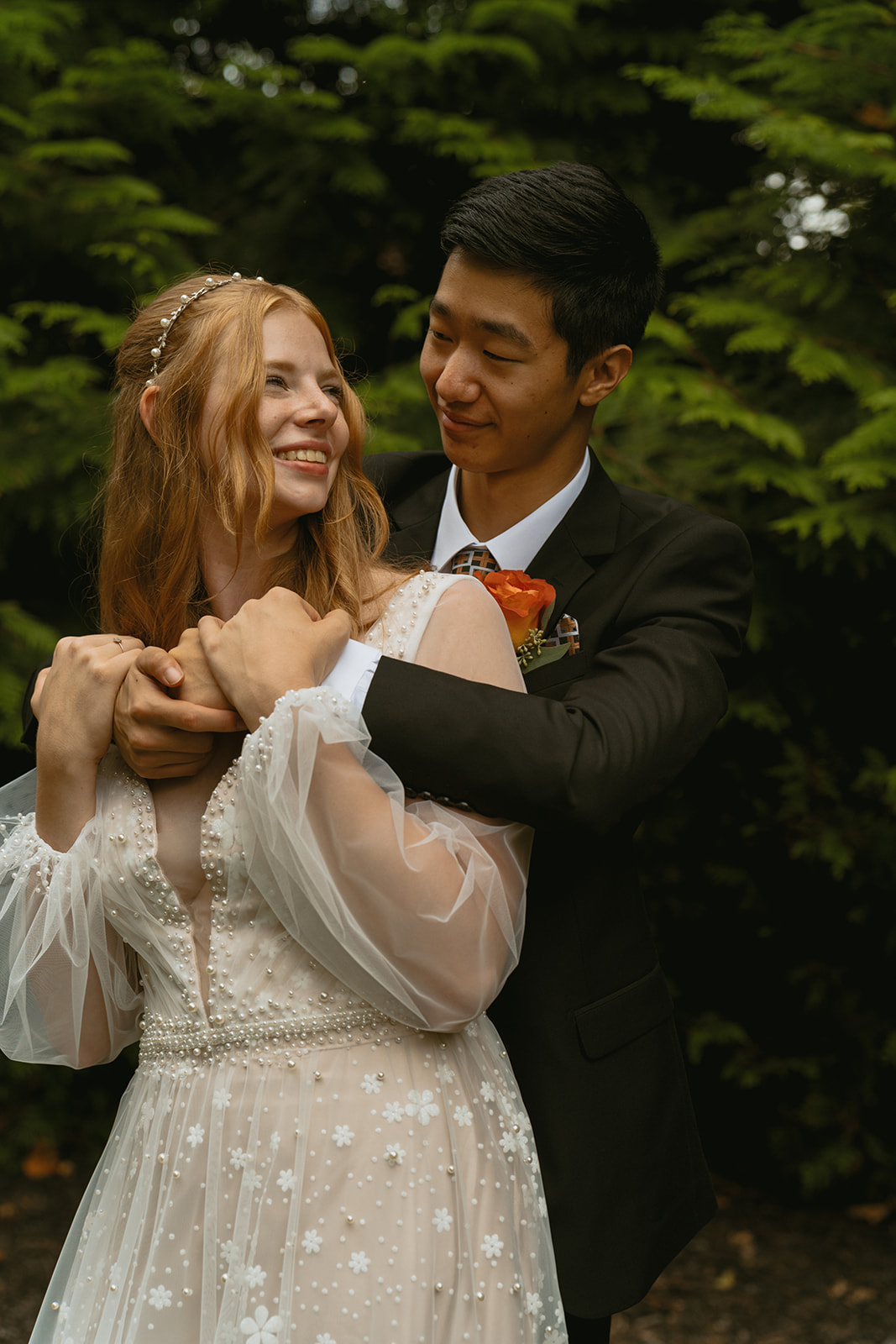 bride and groom share an intimate moment during their Michigan winter elopement