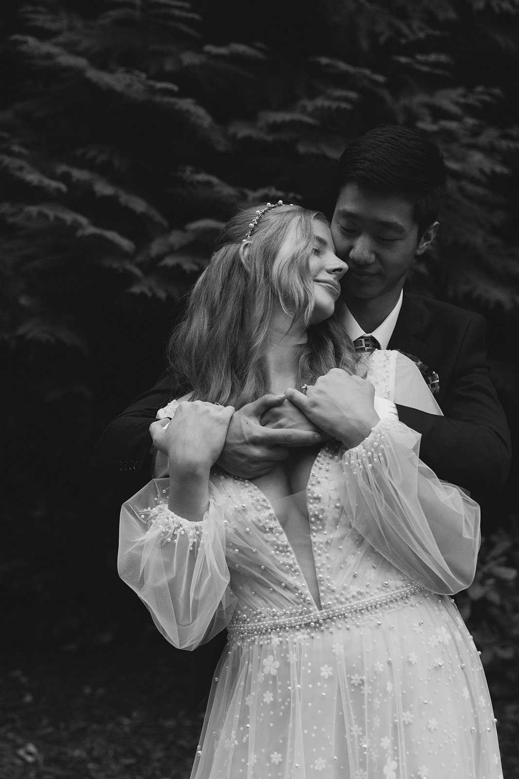 bride and groom share an intimate moment during their Michigan winter elopement