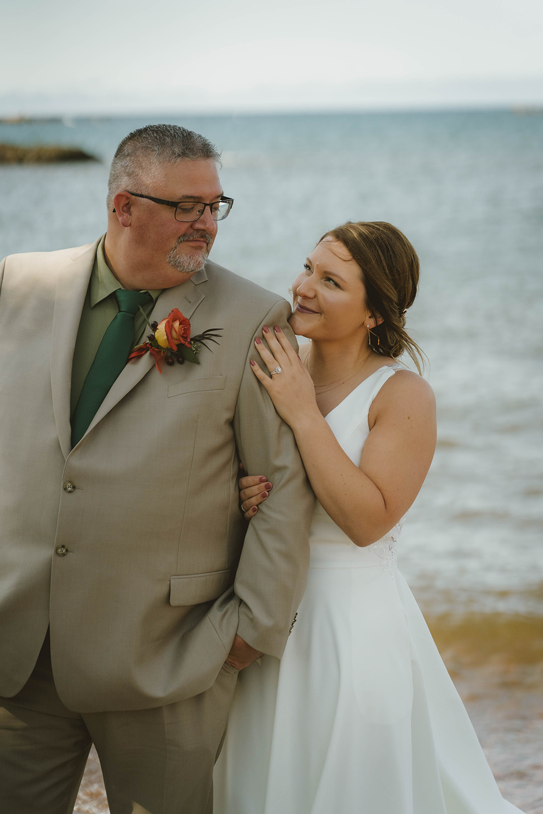 documentary style photos of the bride and groom from their dreamy wedding day at Copper Harbor