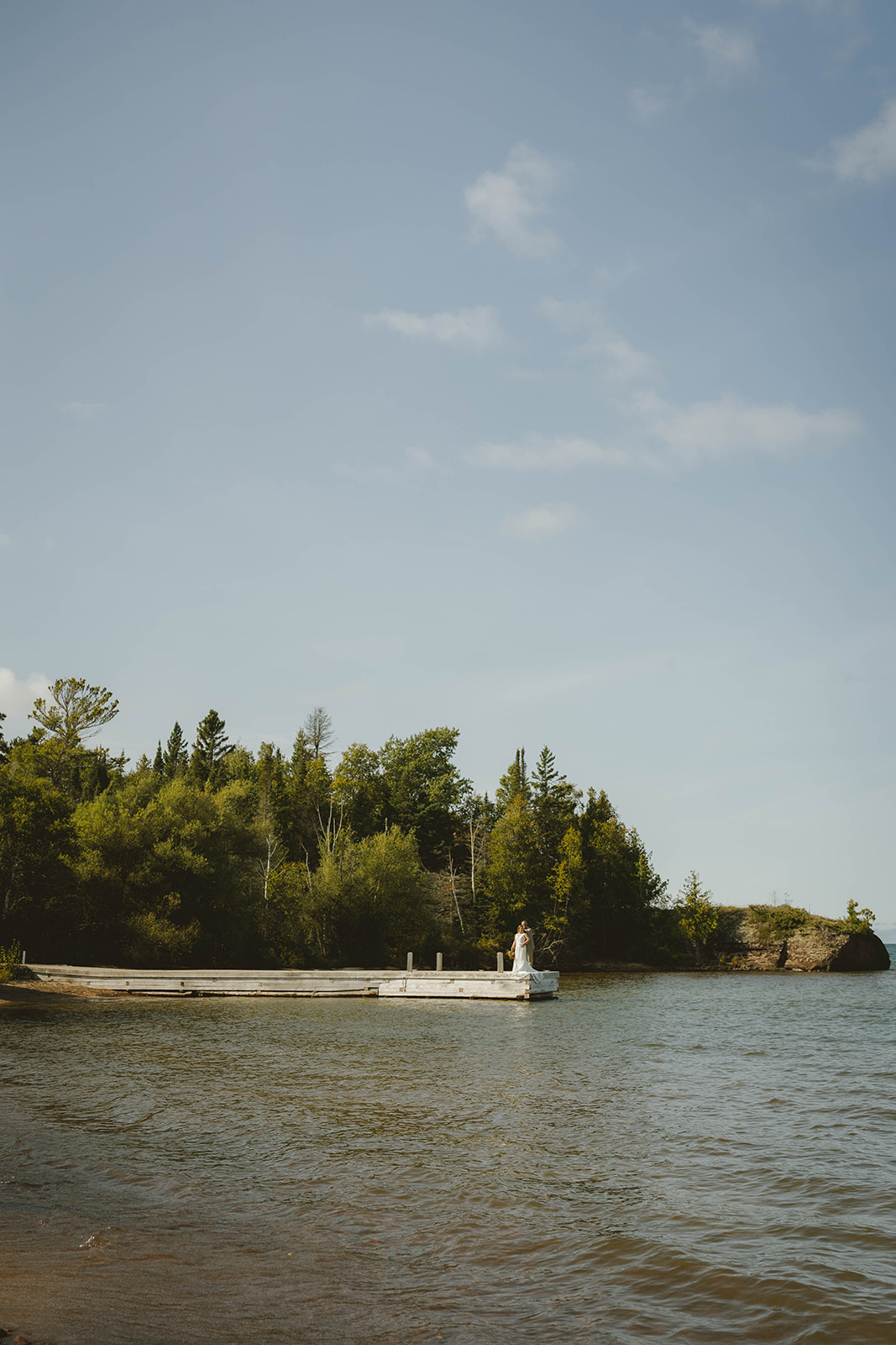 documentary style photos of the bride and groom from their dreamy wedding day at Copper Harbor
