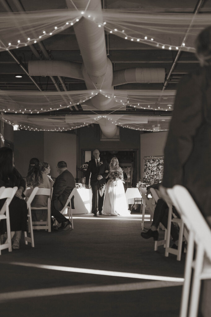 stunning winter wedding ceremony takes place at one of the top 5 winter wedding venues in Michigan