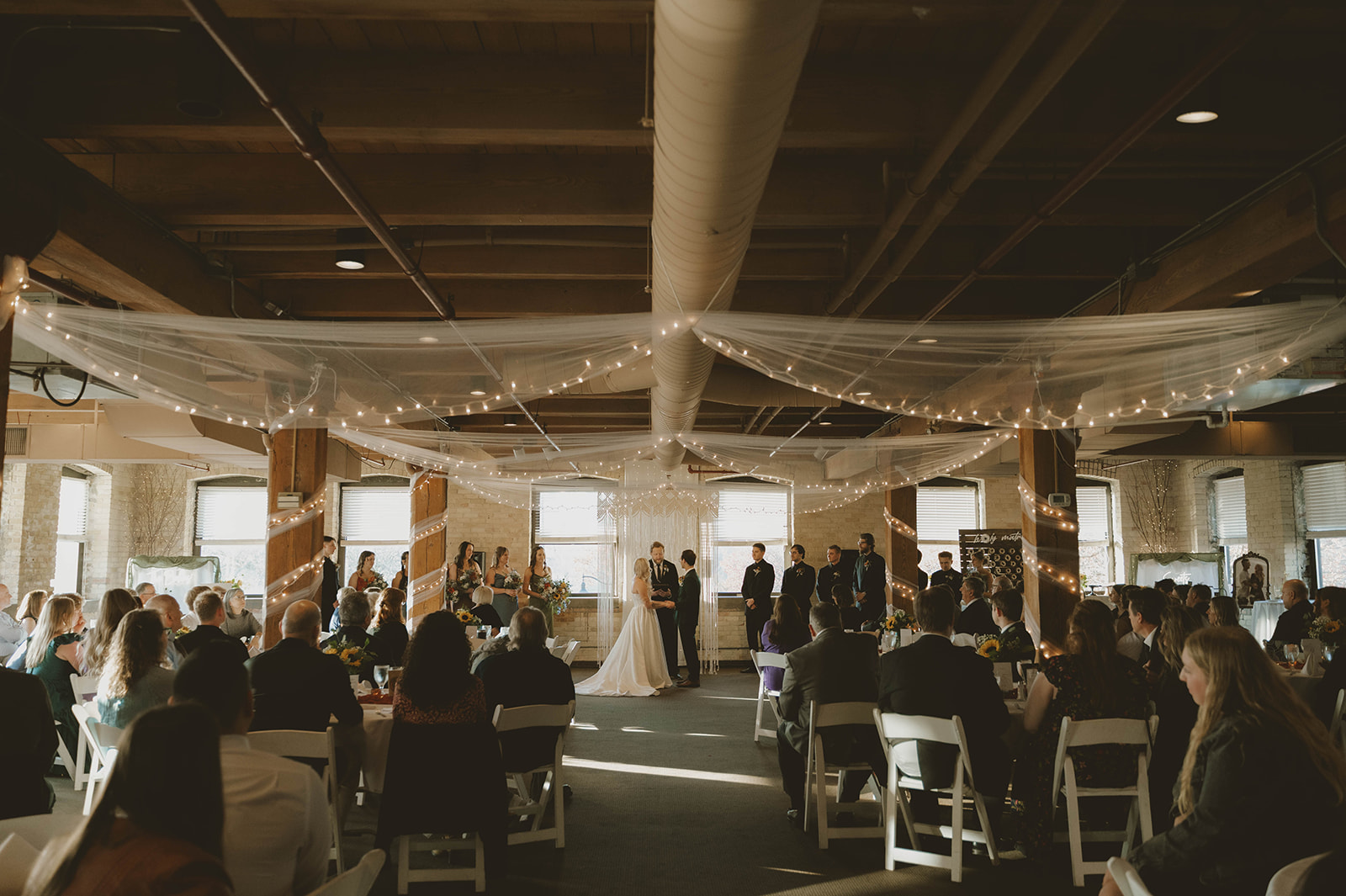 stunning winter wedding ceremony takes place at one of the top 5 winter wedding venues in Michigan