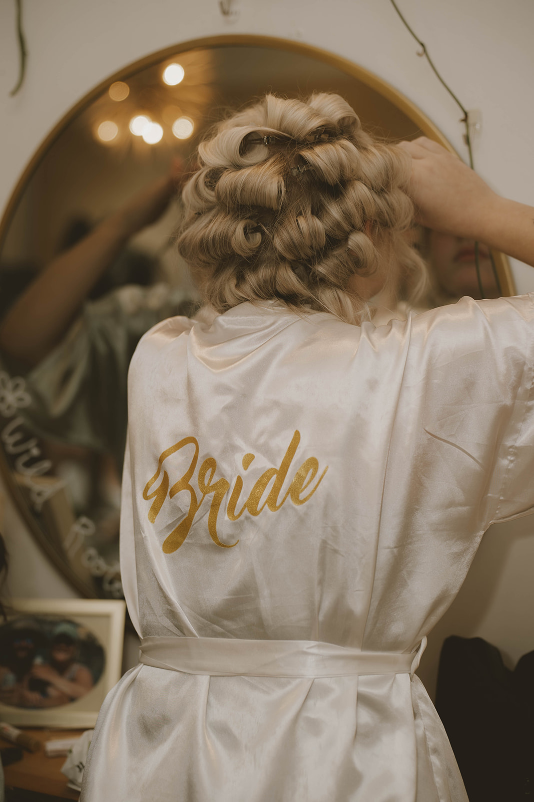bride finishes prep for her wedding day