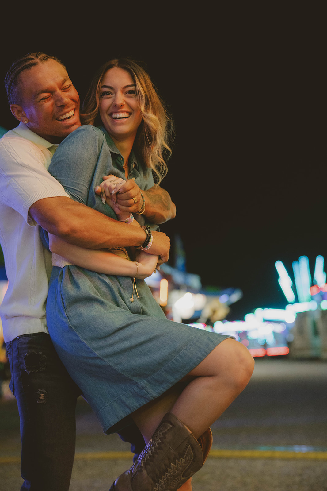 couple share laughs as they explore the state fair during their unique couples photoshoot!