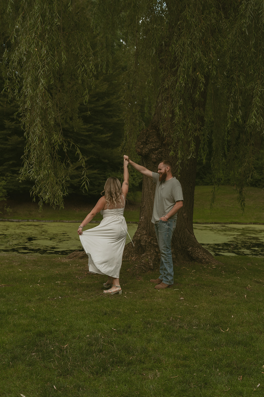 beautiful couple share intimate moments of love during their dow gardens engagement photos 