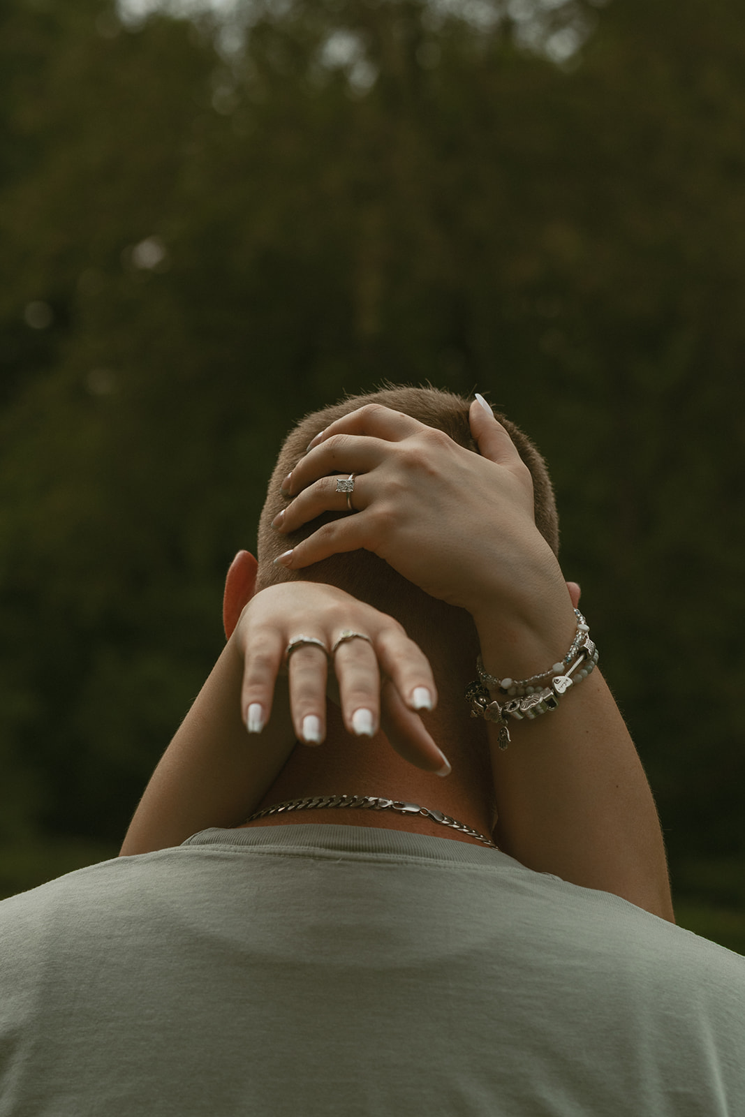beautiful couple share intimate moments of love during their dow gardens engagement photos 