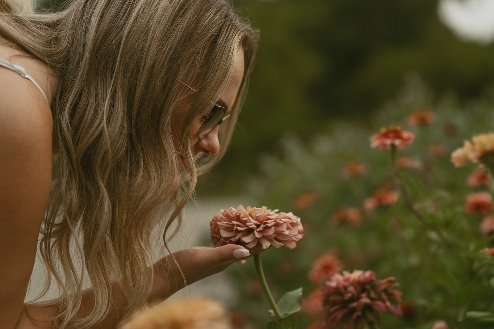 future bride smells a flower 